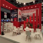 Stand espositivo IBF/25 ITER Business Forum, Marsiglia. Design rosso e bianco, tavoli e sedie per meeting.